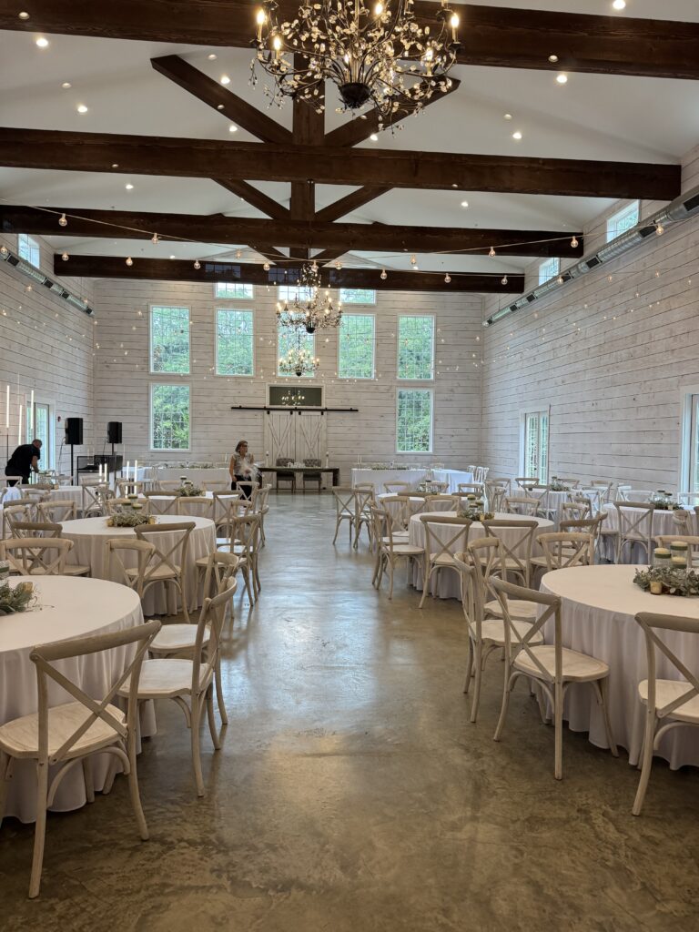table and chair white wedding setup at the establishment barn in terrell tx