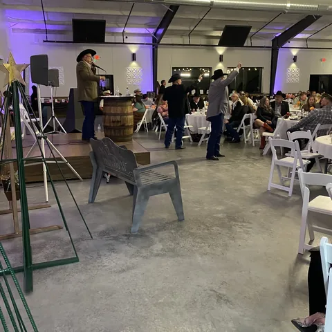 Gala dinner setup inside Caddo Creek venue in Greenville