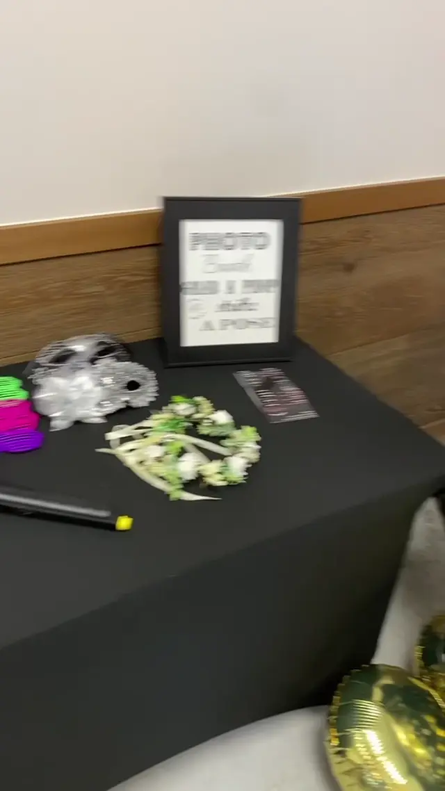 Photo booth prop table at a Greenville gala