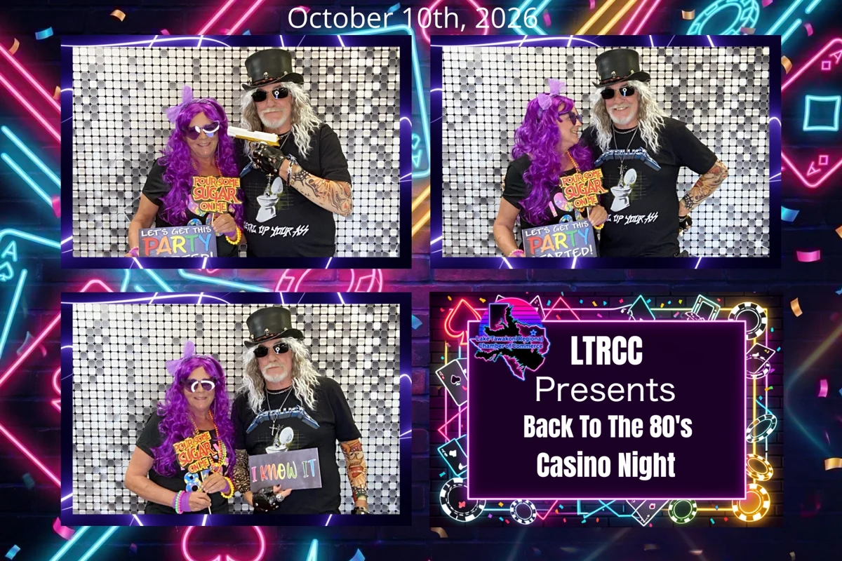 Guests posing with props at the Lake Tawakoni Regional Chamber of Commerce Casino Night 2026 in Quinlan