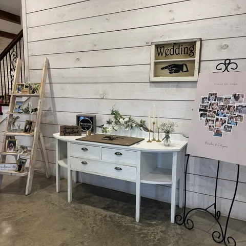 Welcome table and seating chart at The Establishment Barn